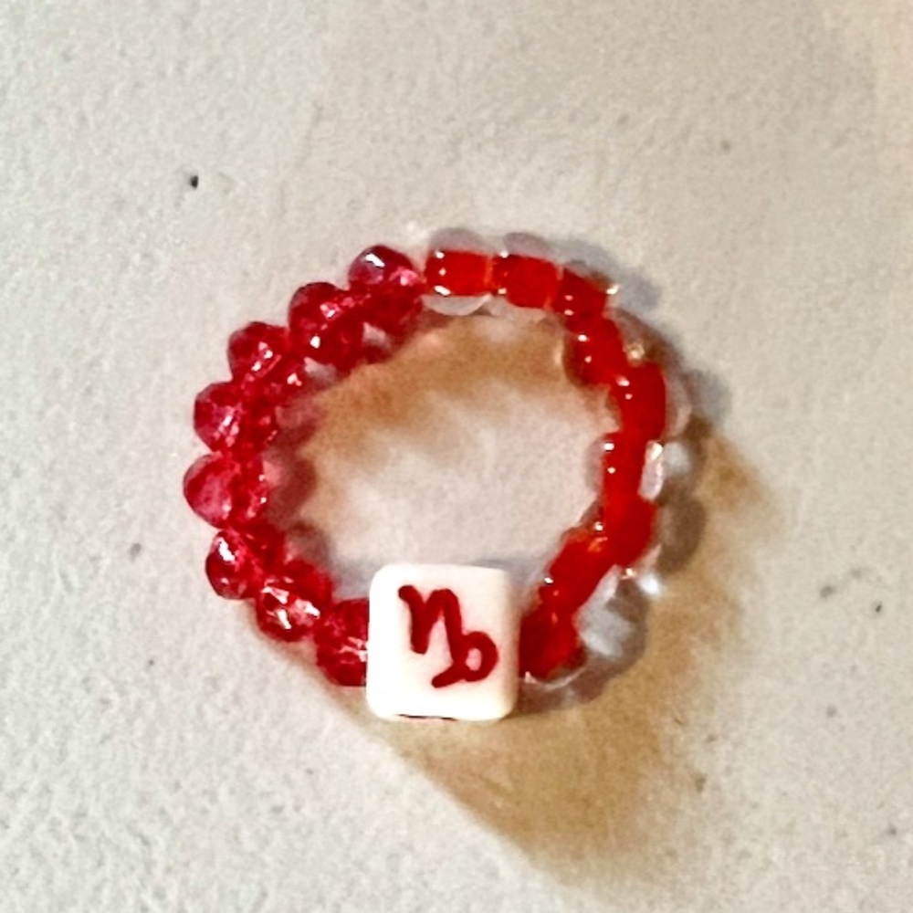 "CAPRICORN" BEADED RING,ONE SIZE, RED